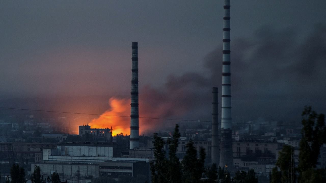 Smoke and flame rise after a military strike on a compound of Sievierodonetsk's Azot Chemical Plant, as Russia's attack on Ukraine continues, in Lysychansk. Credit: Reuters Photo