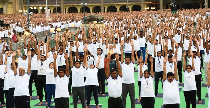 PM Modi performs yoga in Mysuru. Credit: Twitter/ @NarendraModi