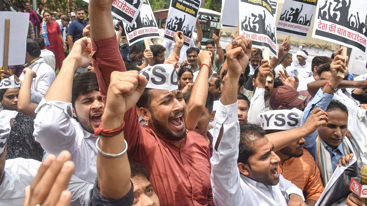 The opposition is attacking the BJP government for playing with the future of youngsters by offering a job which does not have financial and social security. Credit: PTI Photo