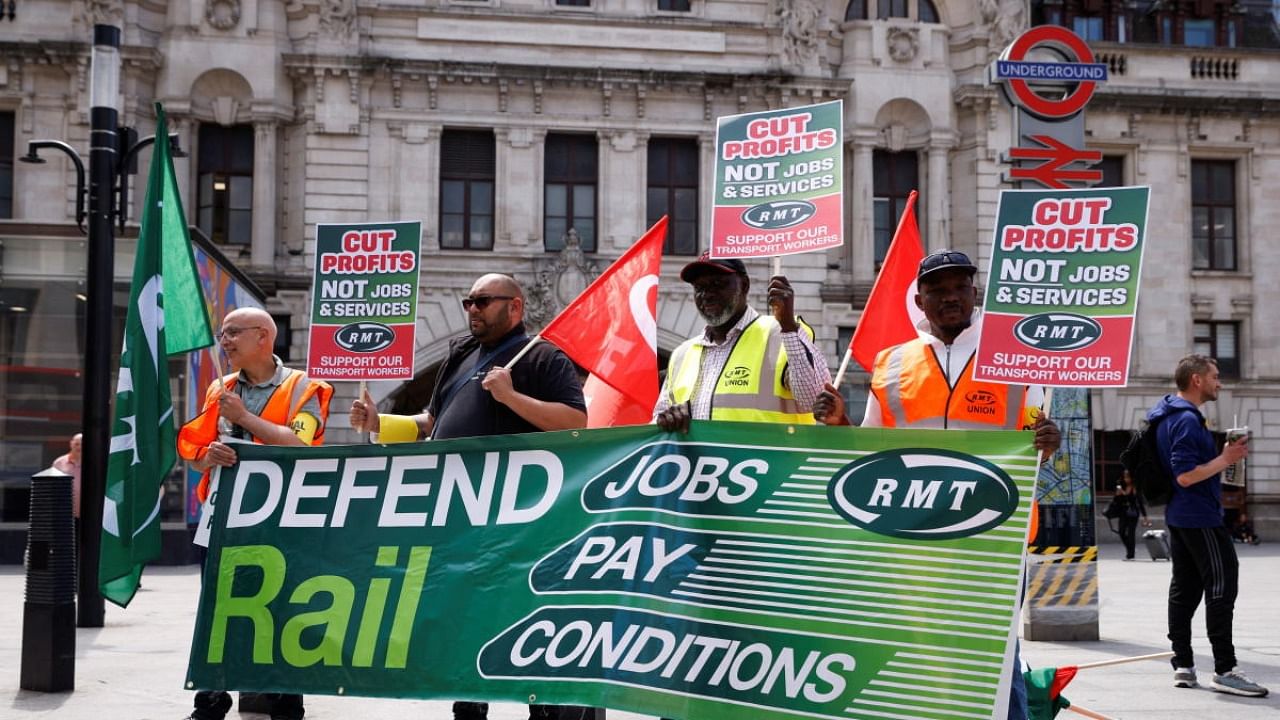 RMT union members picket outside Victoria Station, on the first day of national rail strike, in London, Britain June 21, 2022. Credit: Reuters Photo