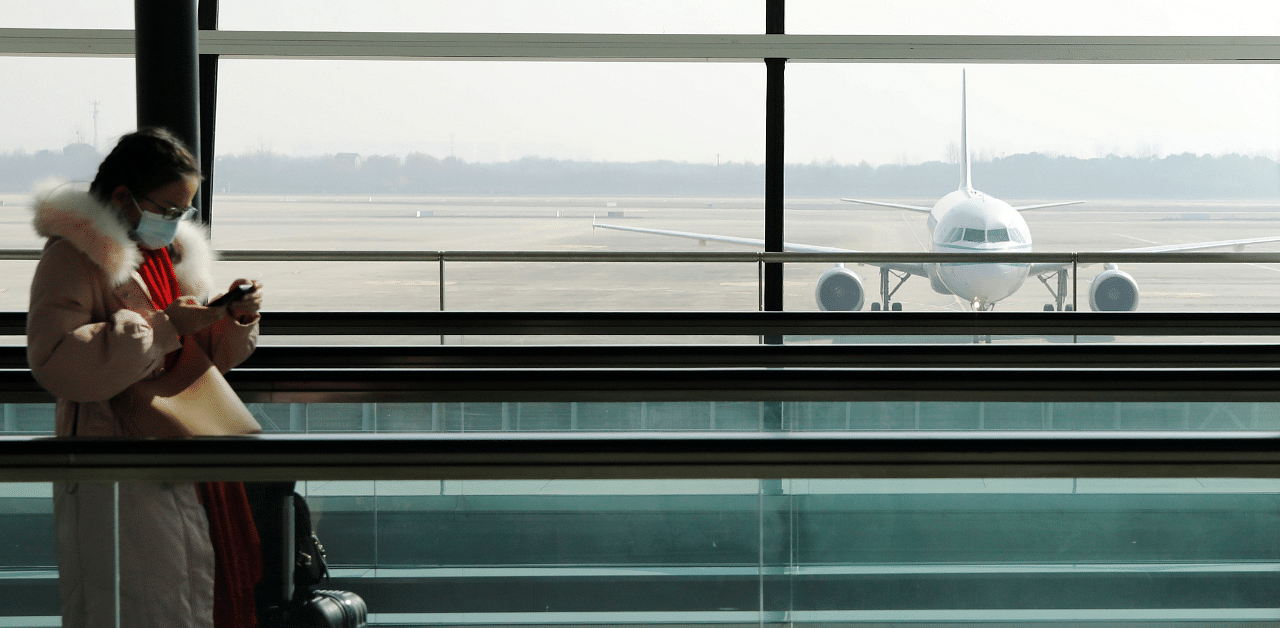 Schiphol, the Netherlands' busiest airport, is trimming flights, saying there are thousands of airline seats per day above the capacity that security staff can handle. Credit: Reuters File Photo