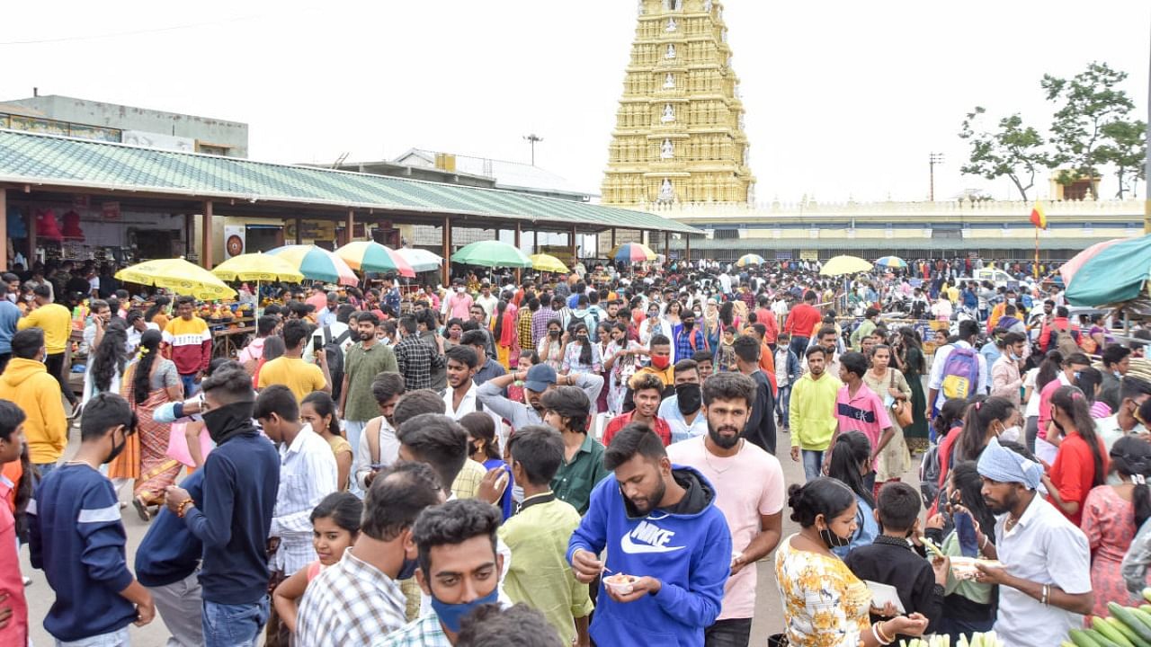 Devotees throng the Chamundeshwari temple during the month of Ashada atop the Chamundi Hill in Mysuru. Credit: DH file photo