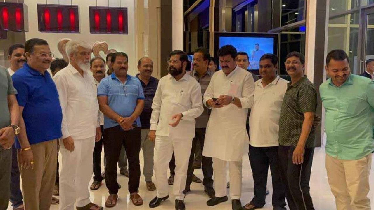Rebel Shiv Sena MLA Eknath Shinde with Minister of Agriculture of Maharashtra Dadaji Dagadu Bhuse and other rebel MLAs at a hotel in Guwahati. Credit: IANS Photo