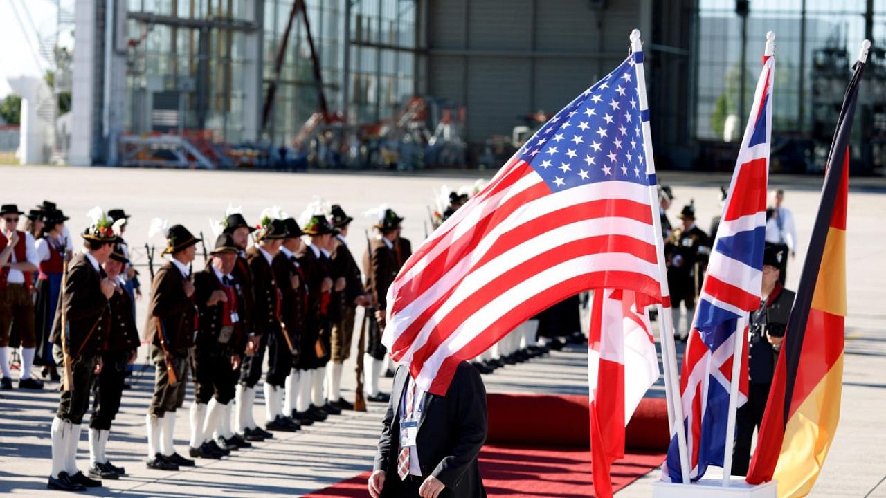 People prepare for arrivals of G7 leaders at Franz-Josef-Strauss airport in Munich to attend the G7 summit. Credit: Reuters photo