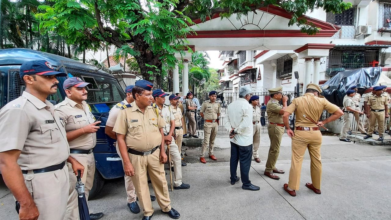 Police personnel outside the residence of Eknath Shinde in Thane. Credit: PTI Photo