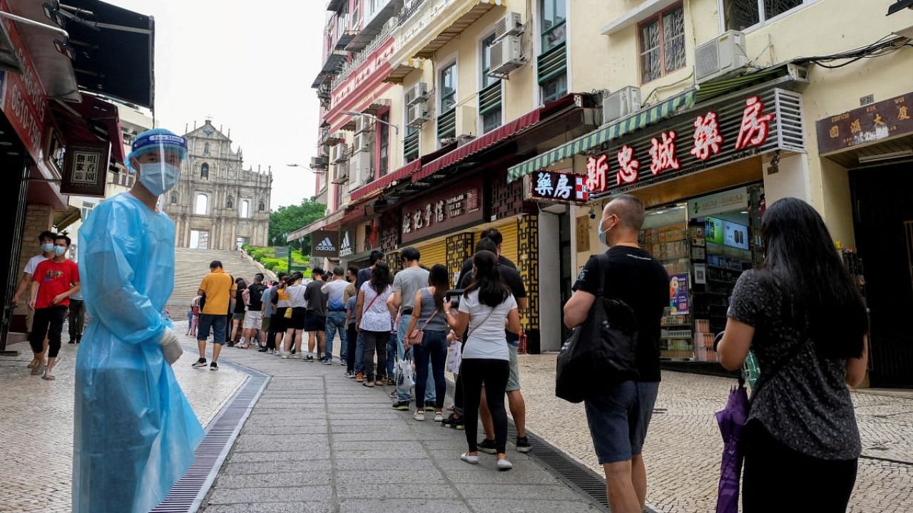 People queue for Covid-19 testing in Macau, China. Credit: Reuters photo