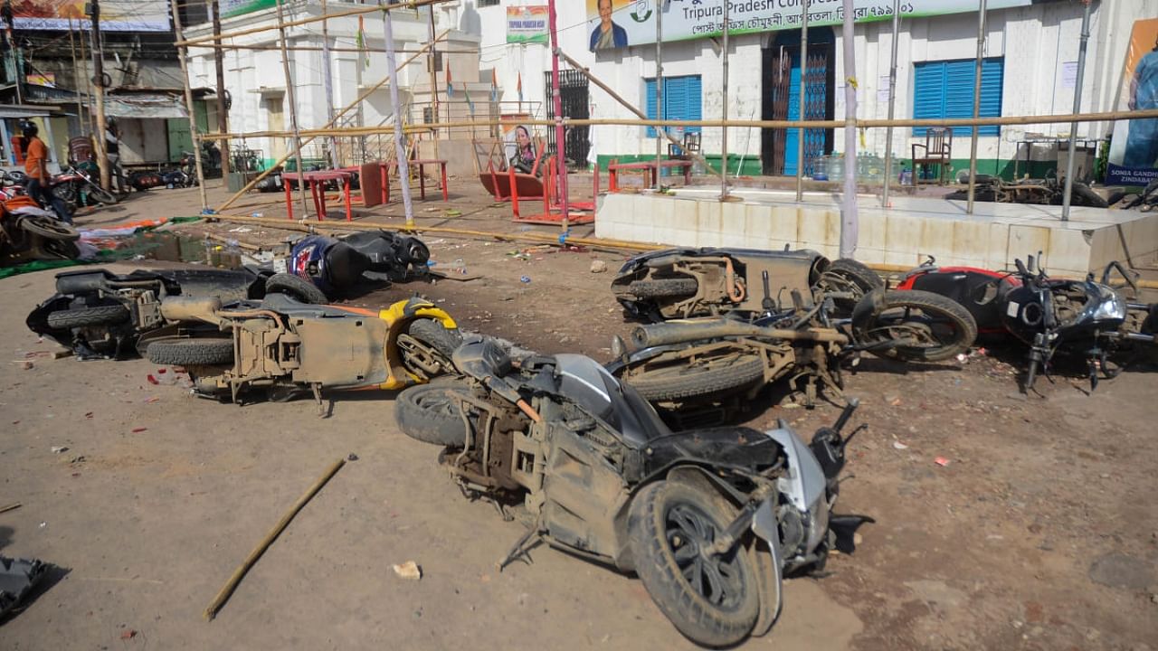 Damaged vehicles after alleged violence on the result day of Tripura Assembly by-elections, outside Tripura Pradesh Congress Committe office, in Agartala. Credit: PTI Photo
