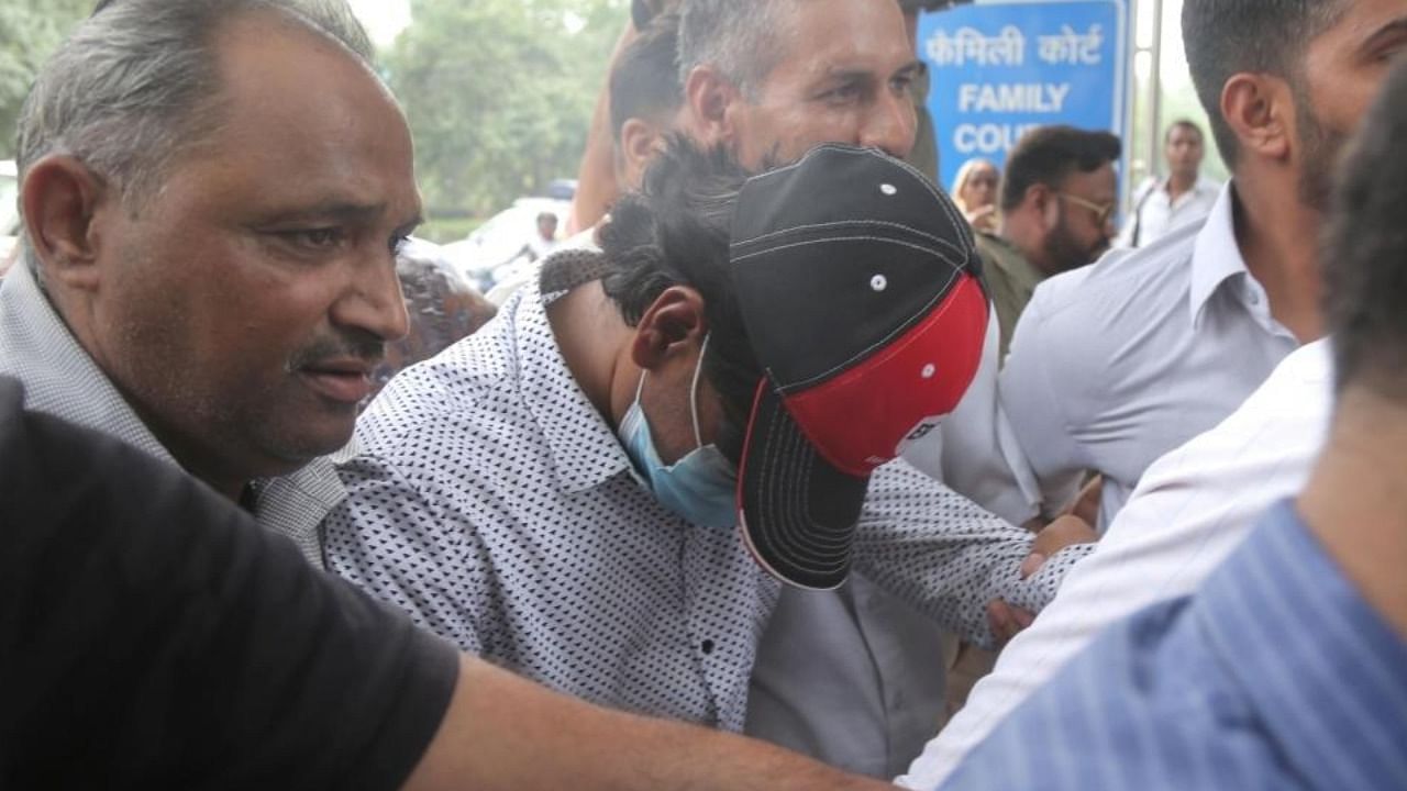 AltNews co-founder Muhammad Zubair being taken to the Patiala House Courts,following his arrest by Special Cell of Delhi Police on charges of hurting religious sentiments in New Delhi on Tuesday June 28,2022. Credit: IANS Photo