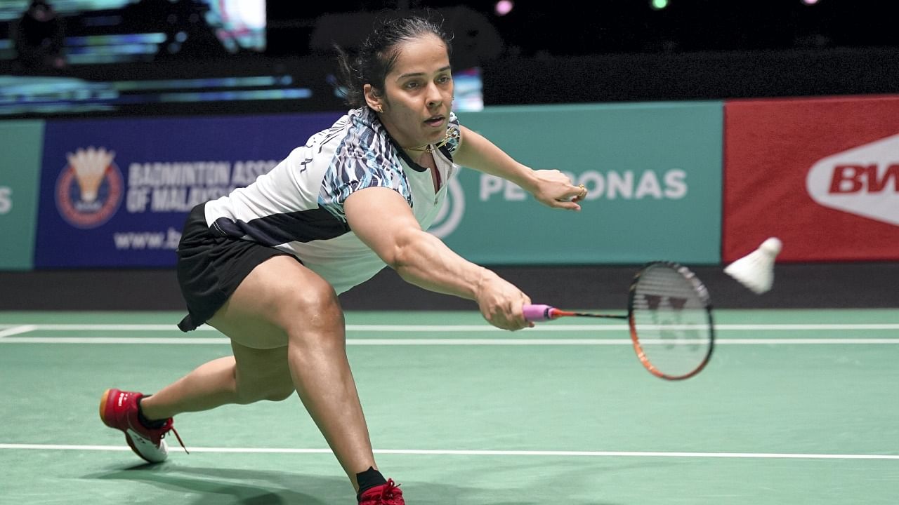 India's Saina Nehwal competes against USA's Iris Wang during their women's singles first round match at Malaysia Open badminton tournament. Credit: AP Photo