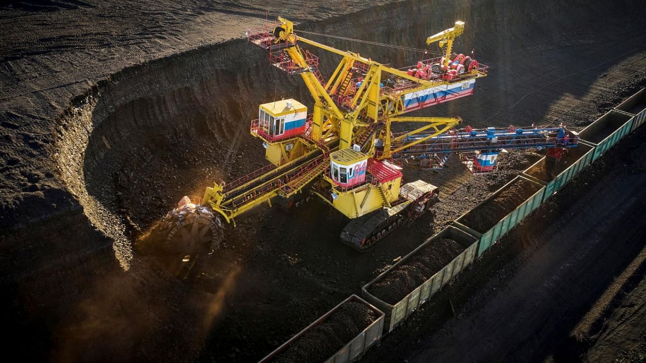 A bucket wheel excavator loads wagons with coal at Borodinsky opencast colliery, owned by the Siberian Coal Energy Company (SUEK), near the Siberian town of Borodino east of Krasnoyarsk. Credit: Reuters photo