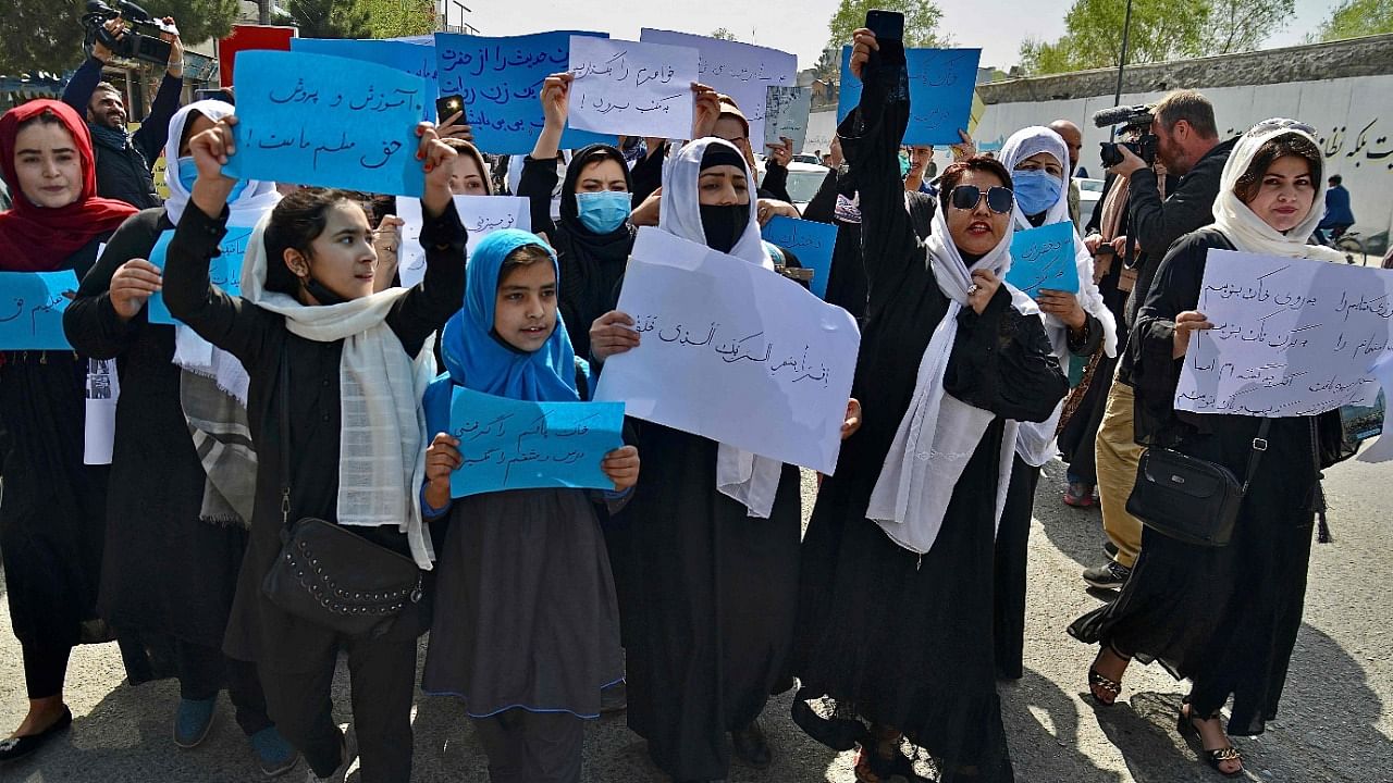 Afghan women and girls take part in a protest in front of the Ministry of Education in Kabul. Credit: AFP Photo