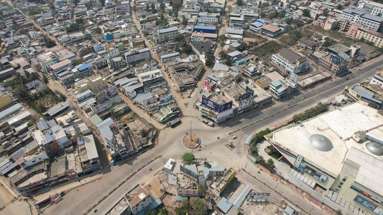 In this aerial photograph empty streets are seen after a curfew was imposed in Shimoga on February 23, 2022, following violence that broke out after the murder of Bajrang Dal activist Harsha. Credit: AFP file photo
