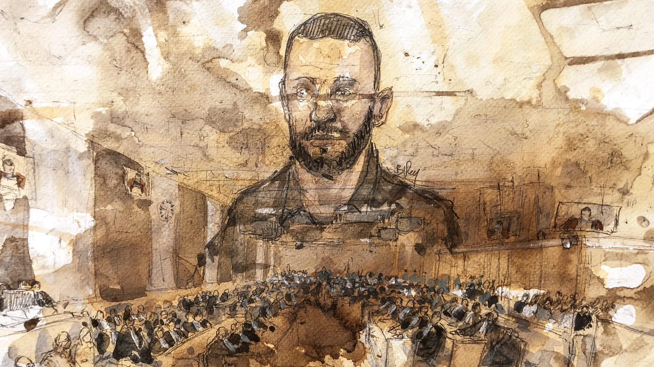 Main defendant Salah Abdeslam drawn over a general view of the courtroom during the trial of the of the November 13, 2015, Paris terror attacks. Credit: AFP Photo