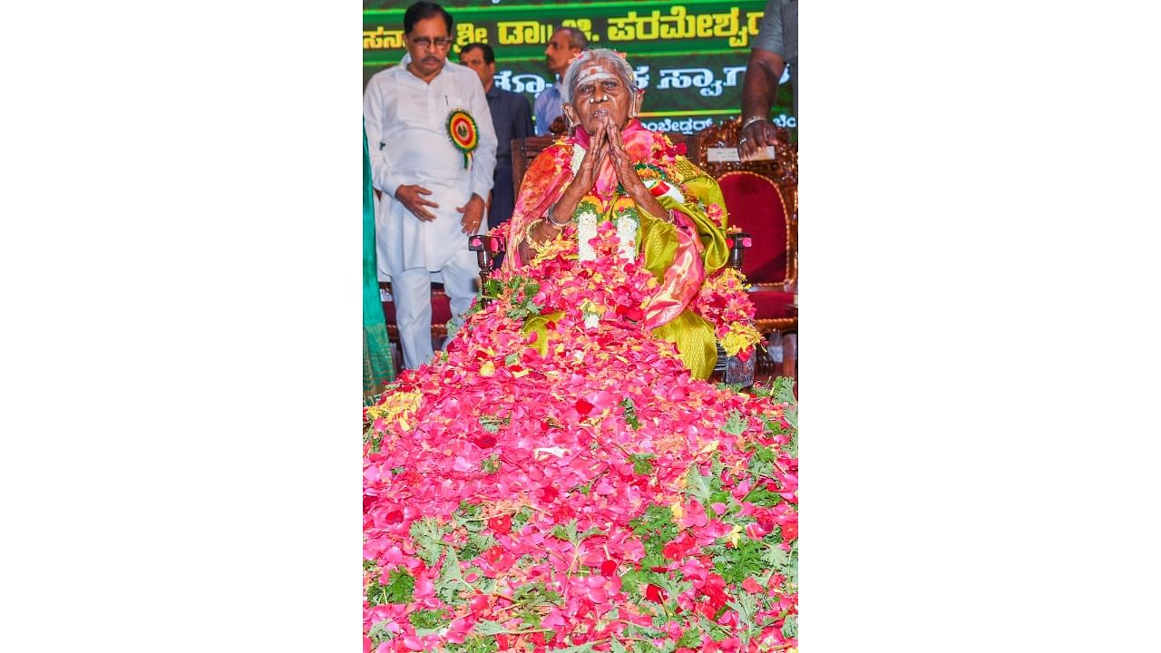 Padma Shri Saalumarada Thimmakka being felicitated at her 111th birthday celebrations at BR Ambedkar Bhavan in Vasanthnagar, Bengaluru, on Thursday. Credit: DH Photo/S K Dinesh