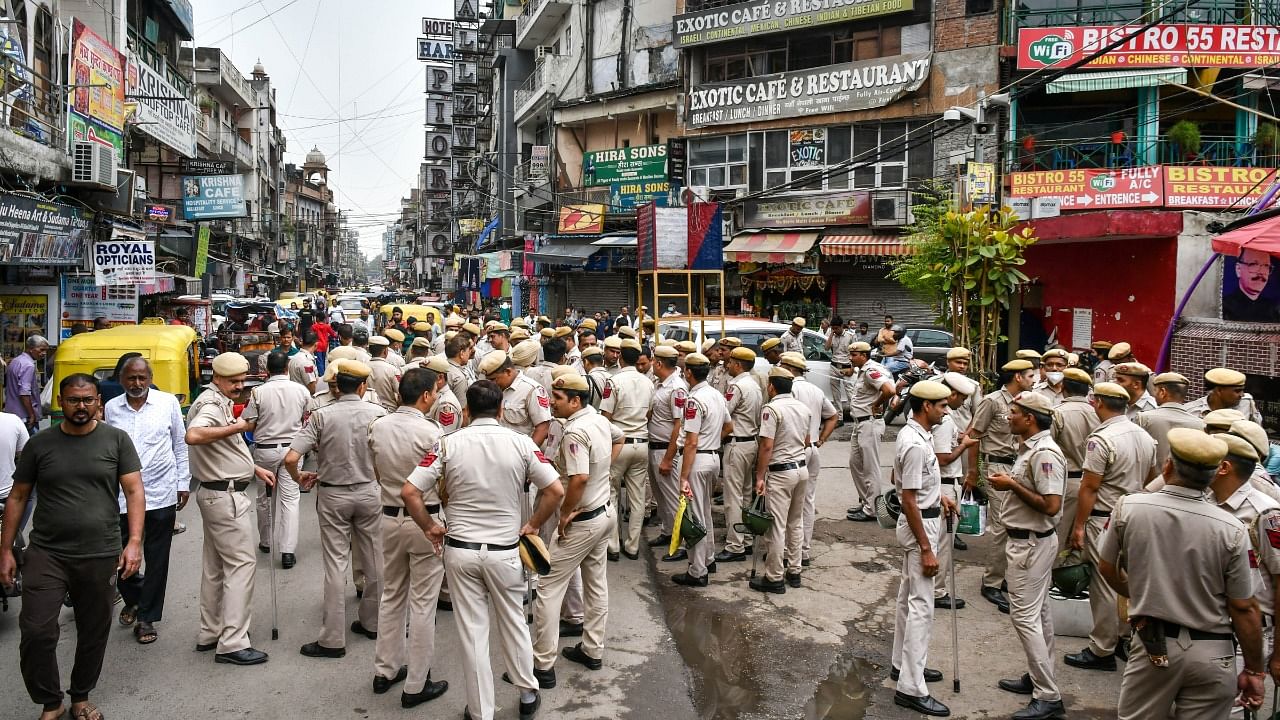 Police force deployed at Paharganj as Bajrang Dal is set to stage a protest over the killing of Udaipur's tailor Kanhaiya Lal. Credit: PTI Photo