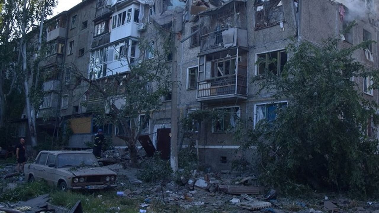 Explosions flattened part of an apartment building while residents slept on Friday, the latest in a series of what Ukraine says are Russian missile attacks aimed at civilians. Credit: Reuters Photo