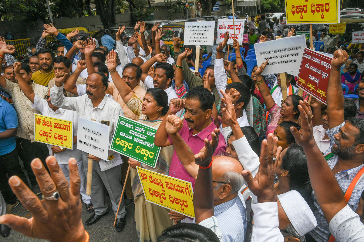 Soumya Reddy, Nagraj, Mohammed Rizwan congress party leaders, workers and residents are staging protest against unscientific delimitation of wards by BBMP at Tilaknagar in Bengaluru on Wednesday, 29th June 2022. Credit: DH Photo/ S K Dinesh