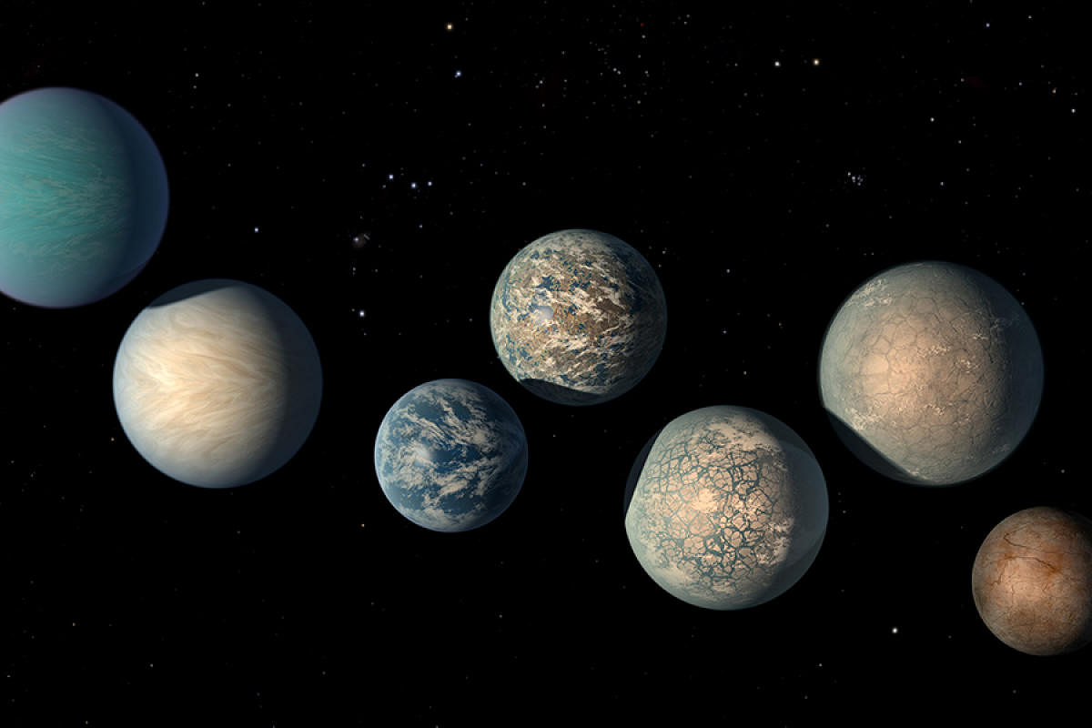 This illustration shows the seven Earth-size planets of TRAPPIST-1, an exoplanet system about 40 light-years away, based on data current as of February 2018. The image shows the planets relative sizes but does not represent their orbits to scale. The art