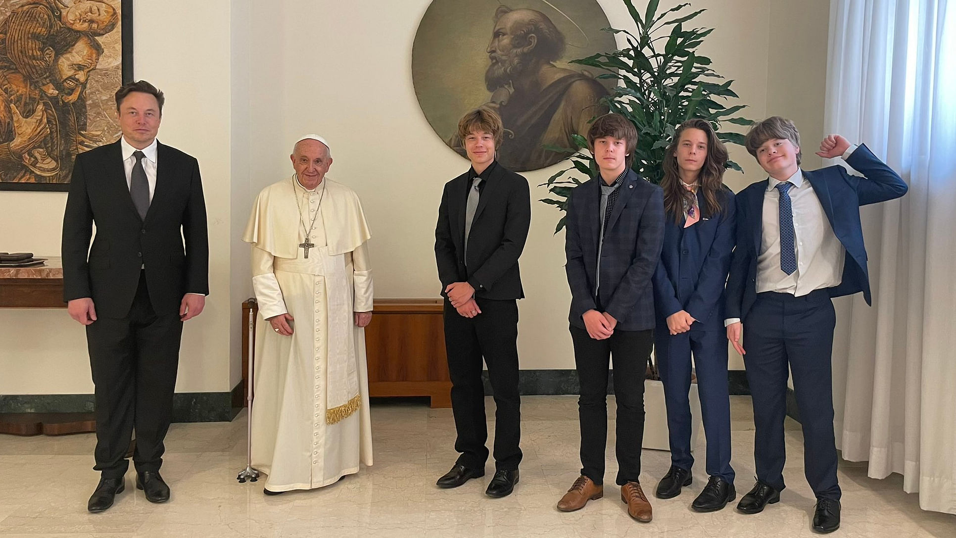 The world's richest person tweeted a picture where he can be seen standing next to the Pope. Musk's four teenage boys are also pictured, but not his 18-year-old transgender daughter. Credit: Twitter/@Elonmusk