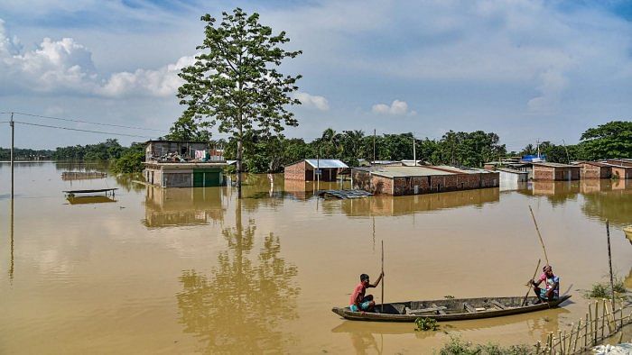 Most of the rivers are maintaining a receding trend though the Brahmaputra, Kopili, Disang, Buridihing and the Barak are flowing above the danger mark at several places. Credit: PTI Photo