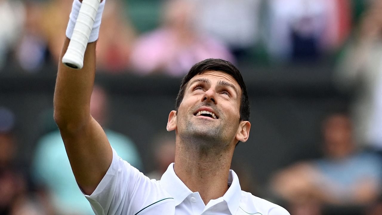 Serbia's Novak Djokovic celebrates beating Serbia's Miomir Kecmanovic during their men's singles tennis match on the fifth day of the 2022 Wimbledon Championships. Credit: AFP Photo