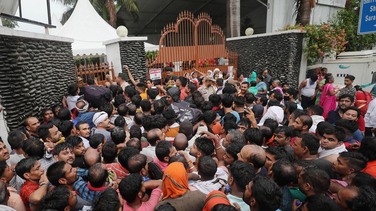 Pilgrims gather for the registration of Amarnath Yatra 2022, in Jammu. Credit: PTI Photo