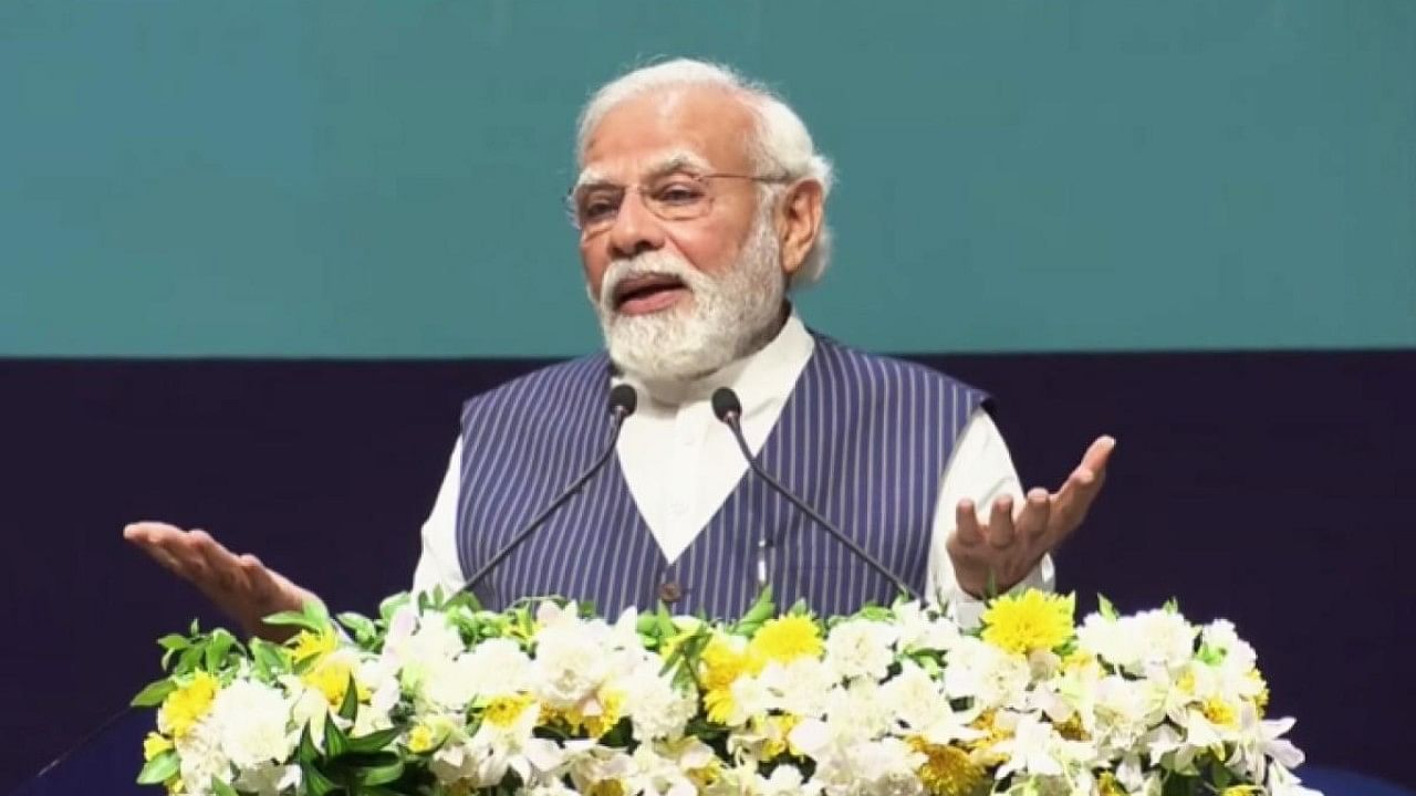 Prime Minister Narendra Modi addresses at the Digital India Week 2022 in Gandhinagar. Credit: IANS Photo