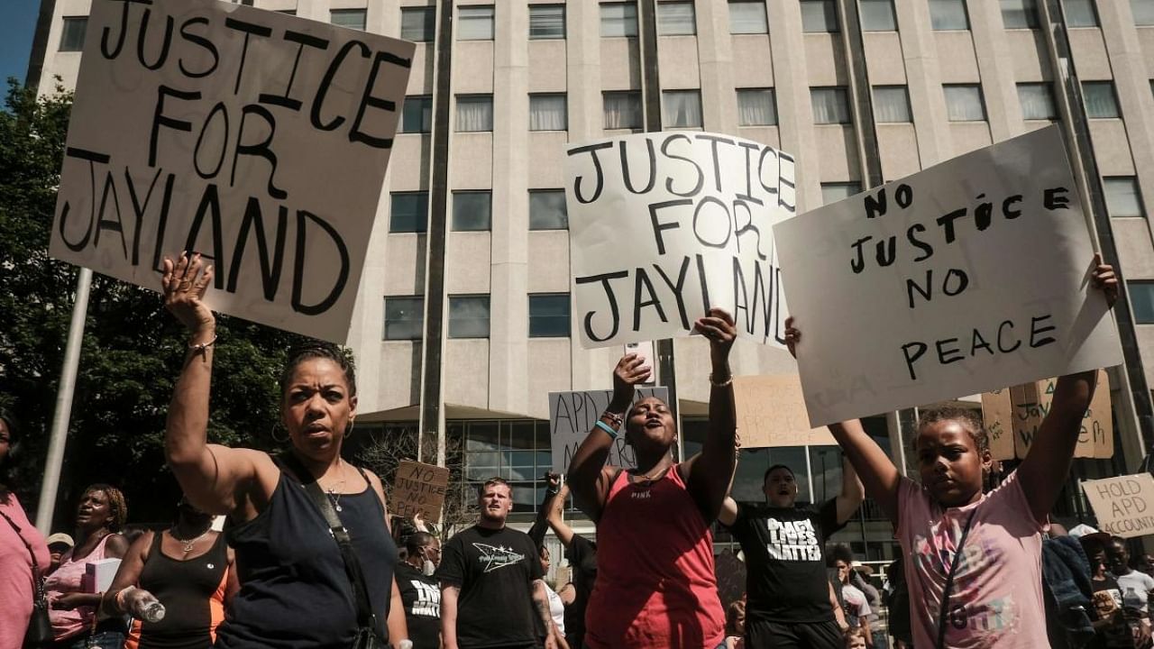 Several hundred protesters marched Sunday in Akron, Ohio after the release of body camera footage that showed police fatally shooting a Black man with several dozen rounds of bullet. Credit: AFP Photo
