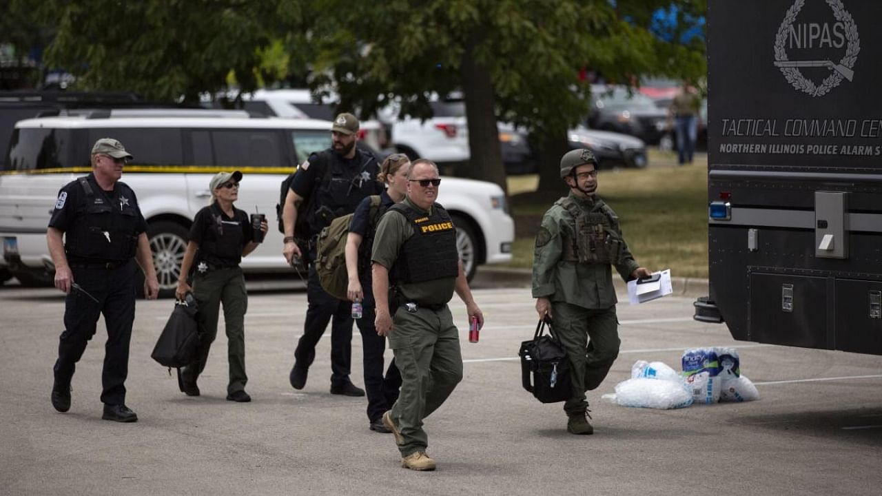  First responders work the scene of a shooting at a Fourth of July parade on July 4, 2022 in Highland Park, Illinois. Credit: AFP Photo