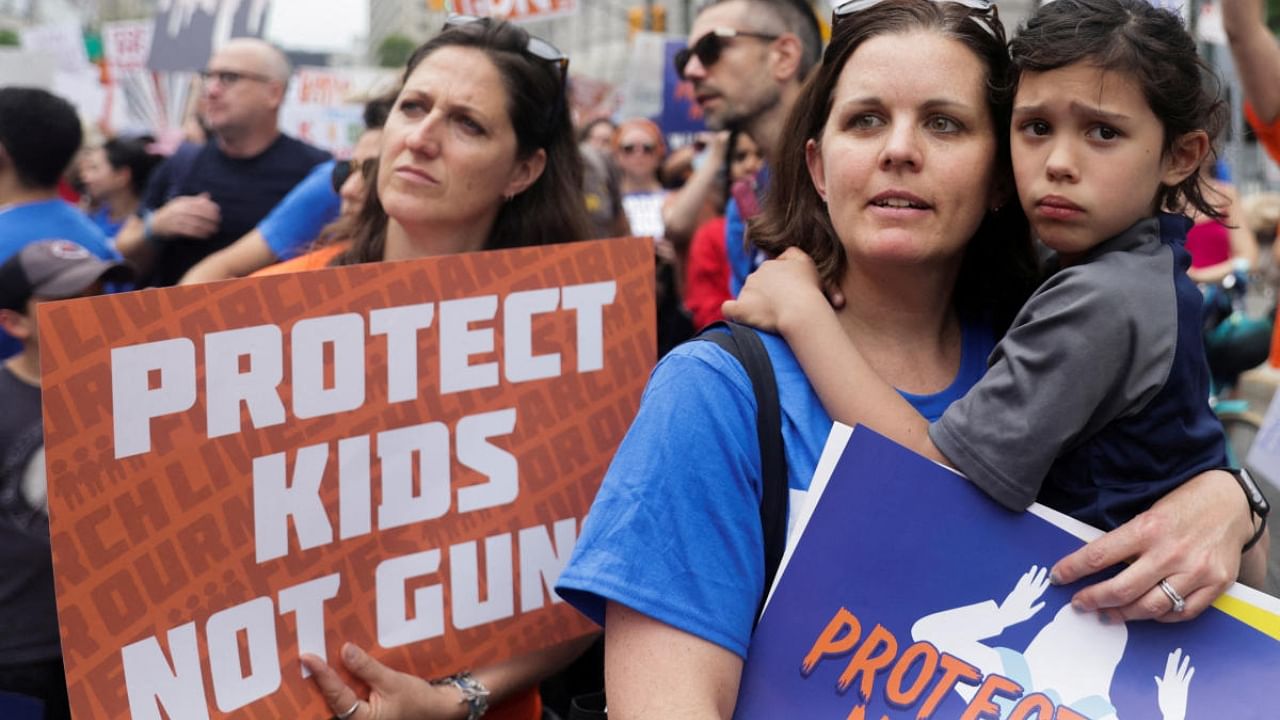 People attend the 'March for Our Lives' rally, one of a series of nationwide protests against gun violence, in New York City, US, June 11, 2022. Credit: Reuters Photo