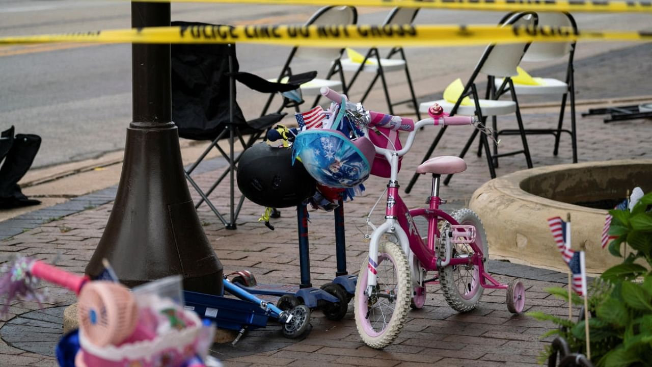 Firing into the holiday crowd, the shooter triggered scenes of total chaos as panicked onlookers ran for their lives, leaving behind a parade route strewn with chairs, abandoned balloons and personal belongings. Credit: Reuters Photo