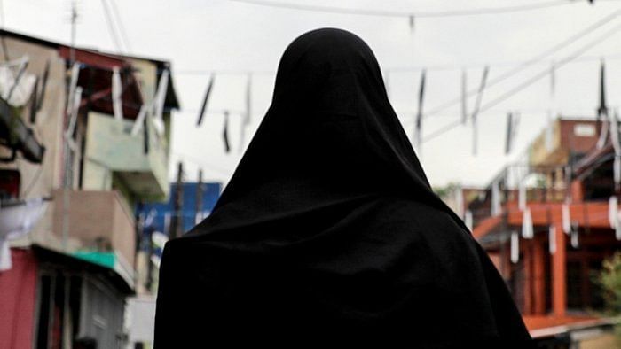 Many have pushed the boundaries over the past two decades by allowing their head coverings to slide back and reveal more hair. Credit: Reuters Photo