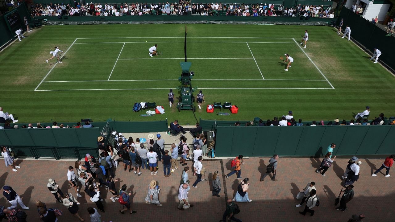 General view during the second round mixed doubles match between india's Sania Mirza and Croatia's Mate Pavic and Georgia's Natela Dzalamidze and David Vega Hernandez. Credit: Reuters Photo