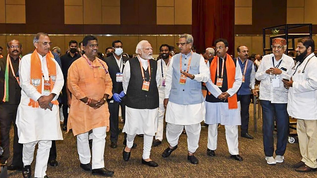 Prime Minister Narendra Modi with BJP leaders during the second day of the BJP's National Executive meeting, in Hyderabad. Credit: Twitter/@BJP4India