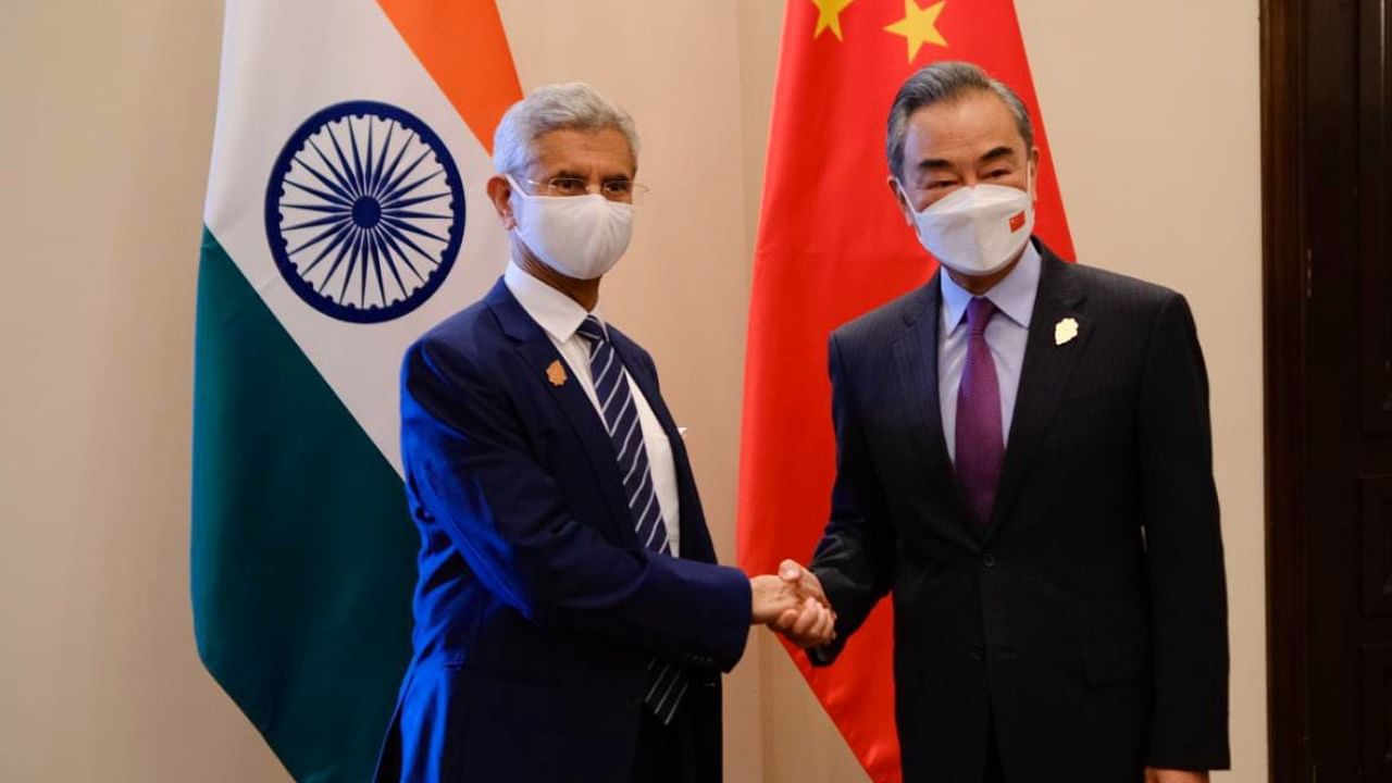 External Affairs Minister S Jaishankar and Chinese Foreign Minister Wang Yi. Credit: Twitter/@DrSJaishankar