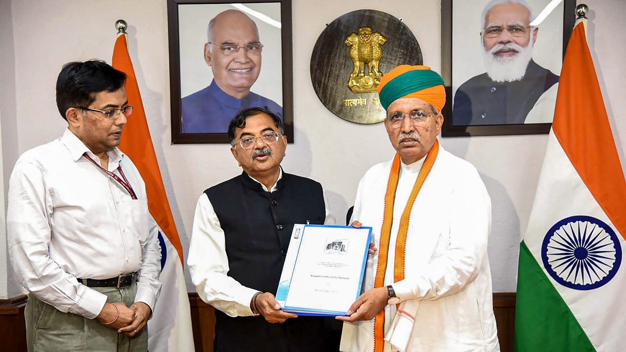 Union MoS for Parliamentary Affairs and Culture Arjun Ram Meghwal receives a report on declaring ‘Mangarh hillock’ as a monument of National Importance by the Chairman of National Monuments Authority(NMA) Tarun Vijay, in New Delhi. Credit: PTI Photo