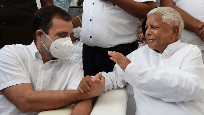 File photo of Rahul Gandhi and Lalu Prasad. Credit: PTI Photo