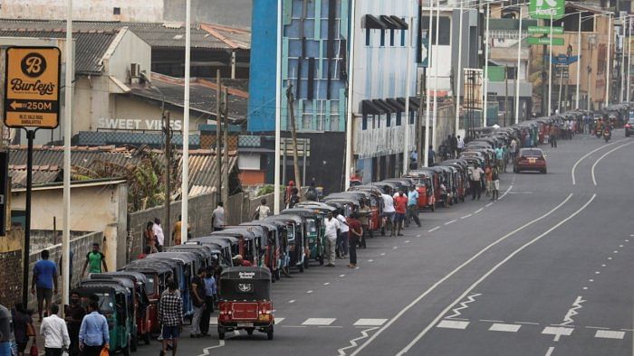 Three-wheelers queue to buy petrol due to fuel shortage, amid the country's economic crisis. Credit: Reuters Photo