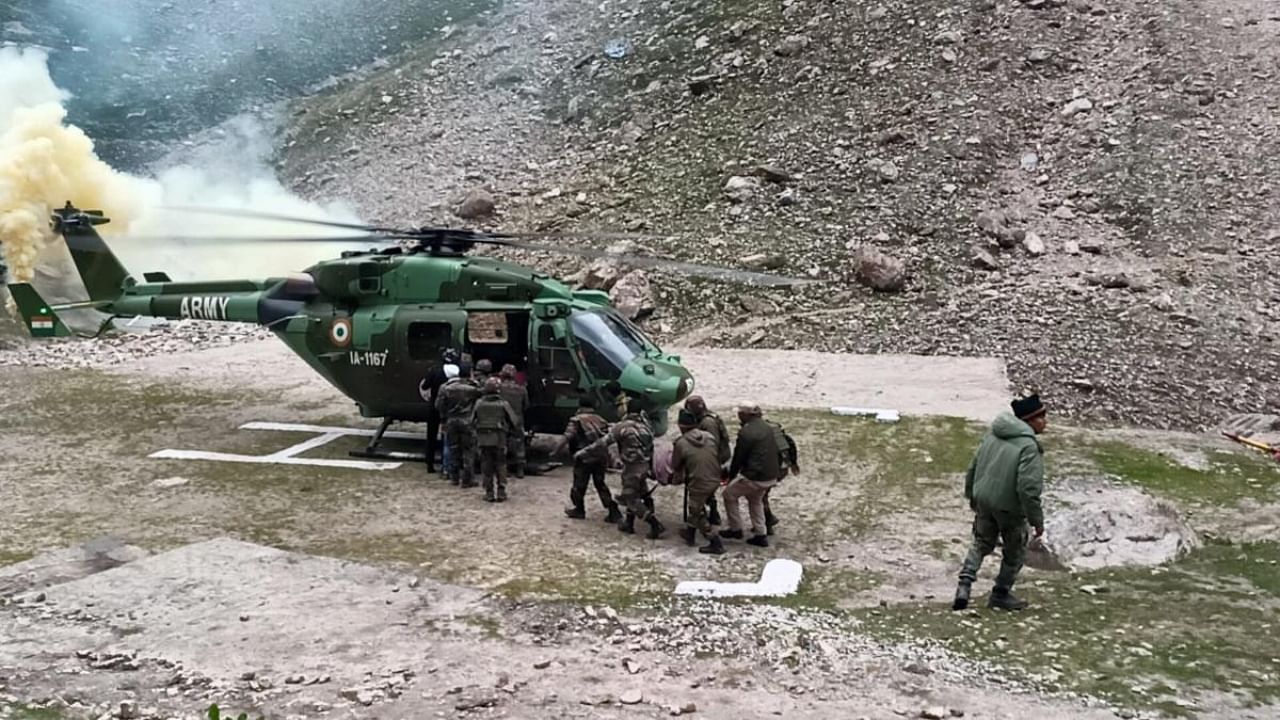 Army personnel carry out the rescue operation in the cloudburst affected areas near the Amarnath cave shrine, Jammu and Kashmir, Saturday, July 9, 2022. Credit: PTI Photo