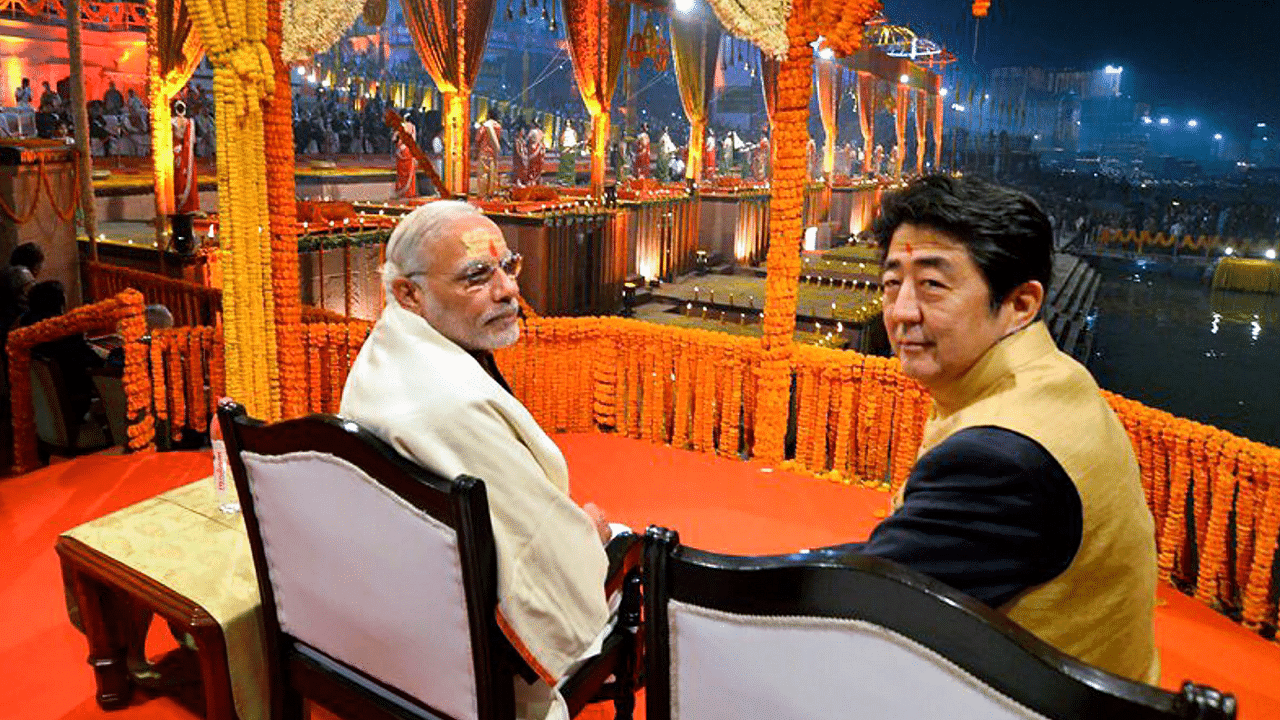 2015 file photo Prime Minister Narendra Modi with then Japan PM Shinzo Abe witnessing the 'Ganga aarti' at Dasashwamedh Ghat in Varanasi. Credit: PTI 
