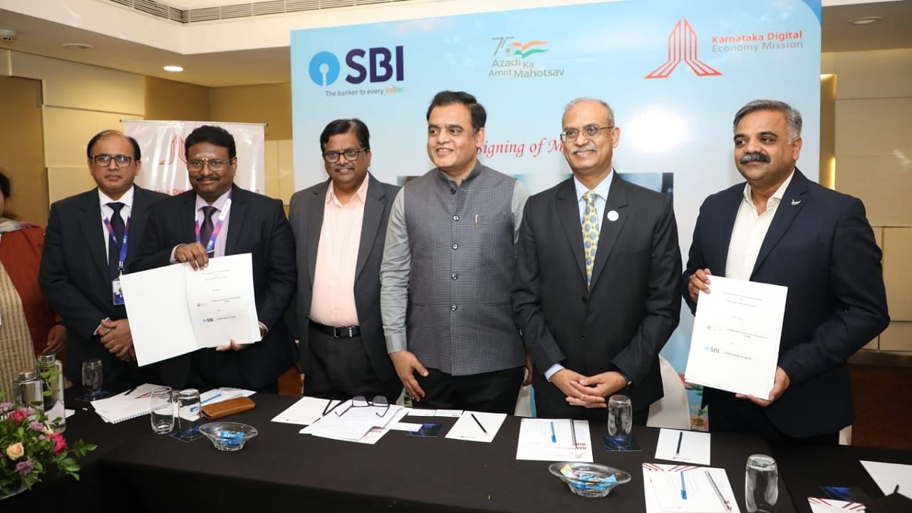 SBI and the KDEM on Friday signed a Memorandum of Understanding. Credit: DH Photo
