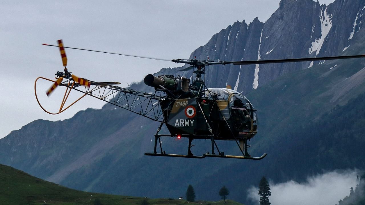 A helicopter carries flash flood affected victims of the Amarnath pilgrimage. Credit: AFP Photo