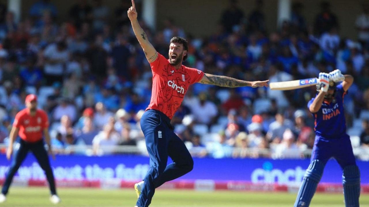 England's Reece Topley appeals unsuccessfully for the wicket of India's Rohit Sharma during the '3rd Vitality IT20' Twenty20 International cricket match between England and India. Credit: AFP Photo