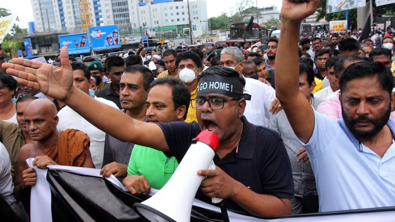 Activists of Sri Lanka's main opposition, shout slogans demanding Sri Lankan President Gotabaya Rajapaksa's resignation amid economic crisis in Colombo. Credit: AFP Photo