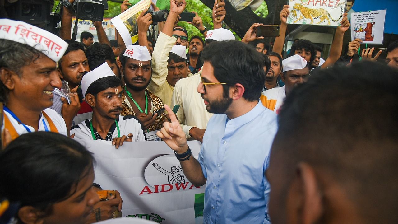 Shiv Sena leader Aaditya Thackeray interacts with activists protesting against the proposed metro car shed project in Aarey forest area, in Mumbai. Credit: PTI Photo