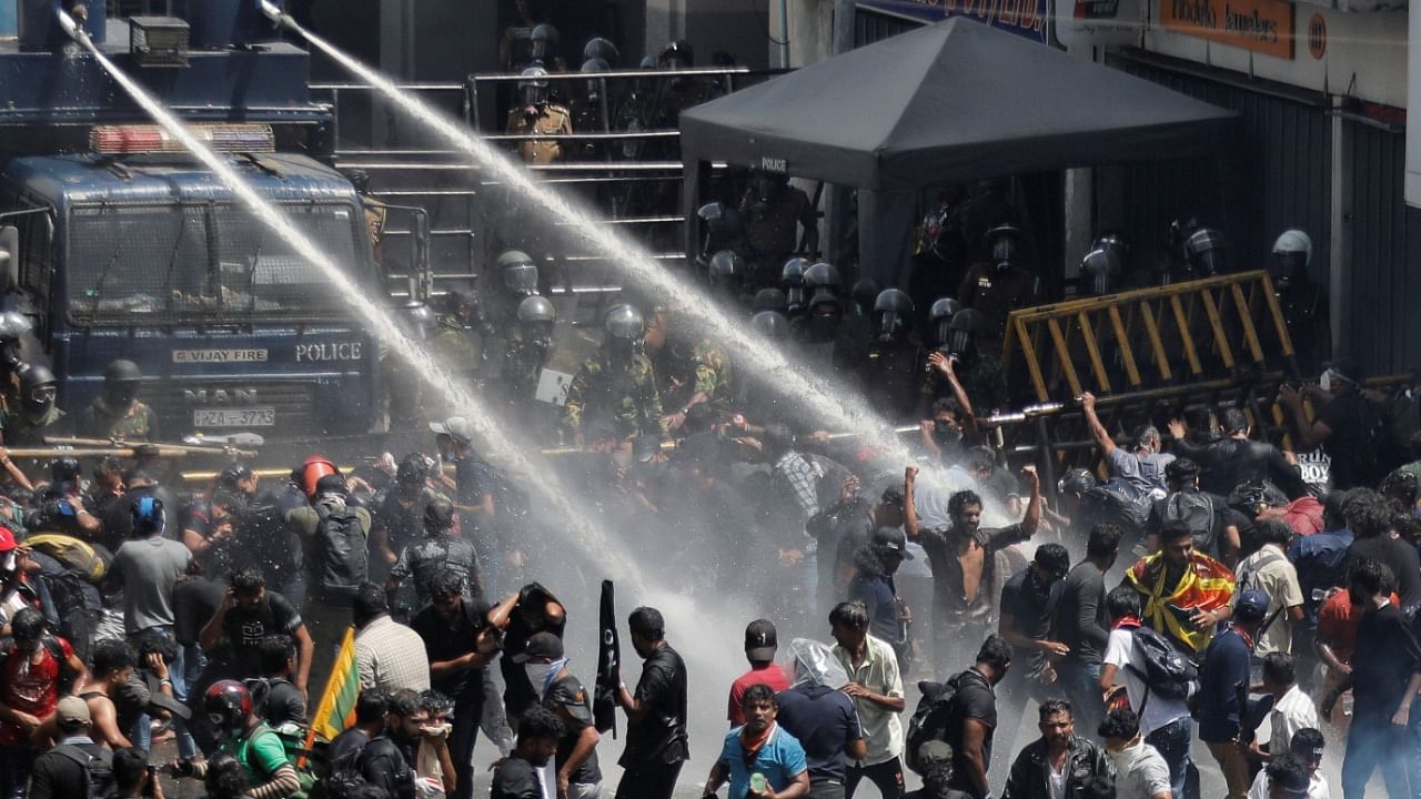 Police uses water cannons to disperse demonstrators near President's residence during a protest demanding the resignation of President Gotabaya Rajapaksa. Credit: Reuters photo