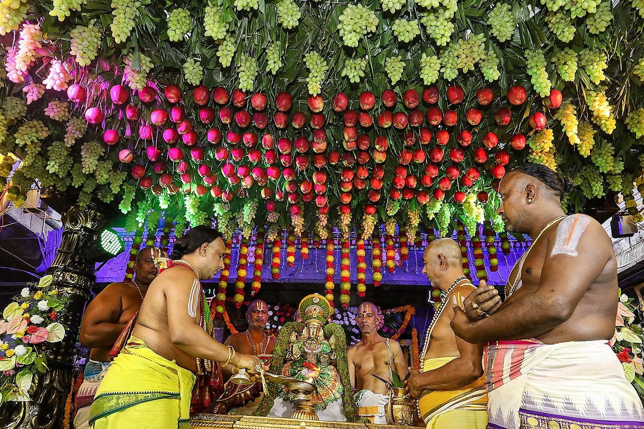 Priests perform 'Snapana Tirumanjanam' on the occasion of annual 'Karthika Brahmotsavam' to Goddess Sri Padmavathi Devi. Credit: PTI Photo