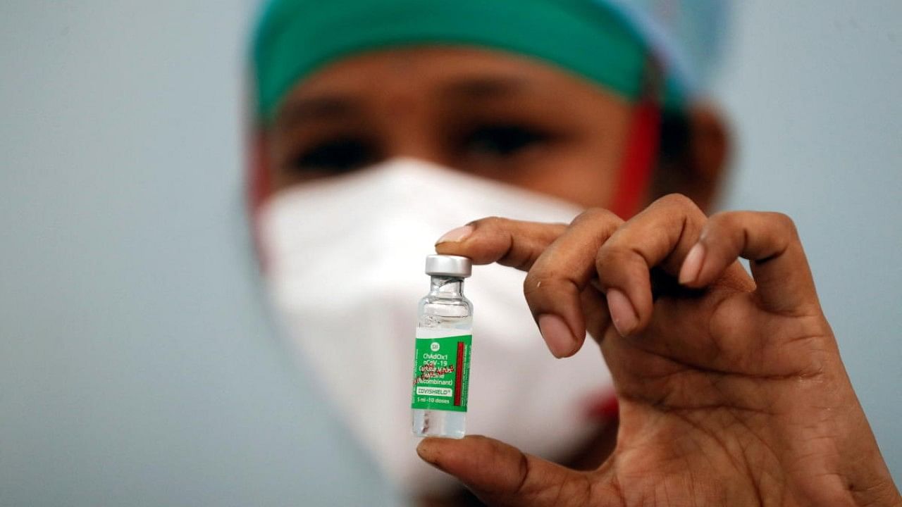 A nurse displays a vial of AstraZeneca's Covishield vaccine, during the coronavirus disease (COVID-19) vaccination campaign, at a medical centre in Mumbai, India, January 16, 2021. Credit :Reuters File Photo