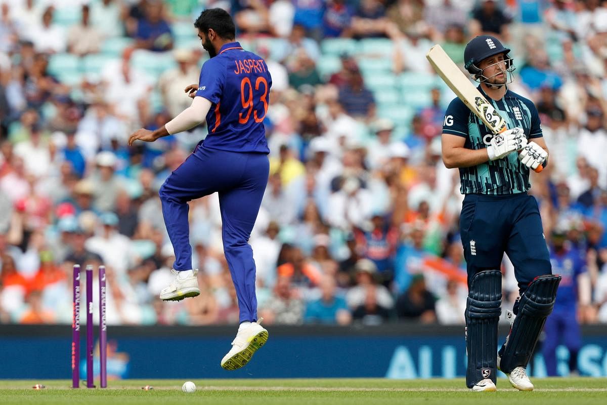 India's Jasprit Bumrah celebrates the wicket of England's Liam Livingstone (R) during the Royal London x ACE One Day International (ODI) cricket match between England and India at The Oval in London on July 12, 2022. Credit: AFP Photo