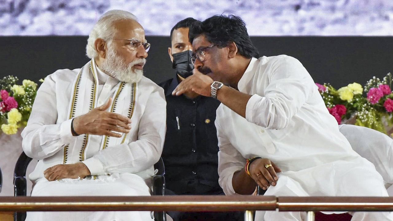 Prime Minister Narendra Modi with Jharkhand Chief Minister Hemant Soren during a prgramme for the inauguration of the Deoghar Airport and launch of various development projects, in Deoghar, Tuesday, July 12, 2022. Credit: PTI Photo